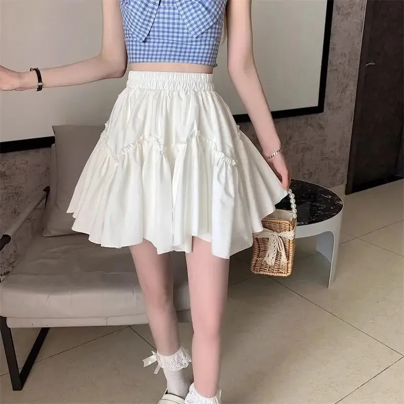 Sweet White Mini Skirt with Ruffle Detail and Irregular Patchwork Design